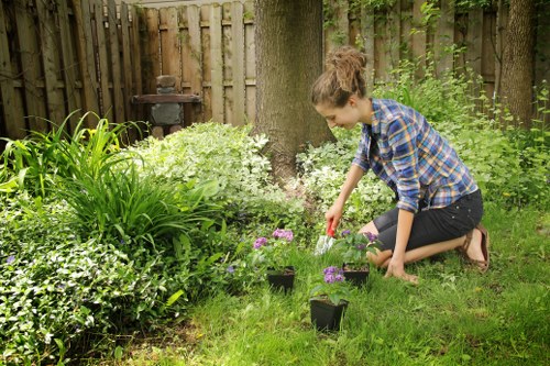 Inspection checklist on clipboard during supplier audit in a garden setting