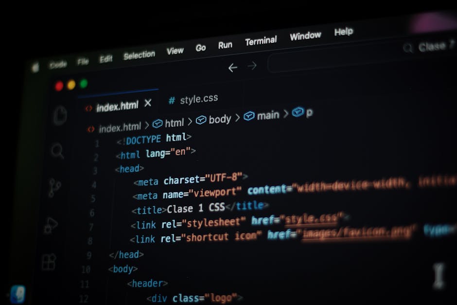 A close-up view of a modern laptop with a backlit keyboard, displaying lines of colorful code on its high-resolution screen. The background is dark, emphasizing the vibrant colors of the coding text, 
